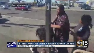 Street fight caught on video over turkey dinner