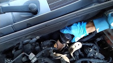 Ssangyong Actyon changing engine oil and engine filter.