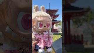 Flip with Me Labubu: Posing in a Sea of Sakura! 💖#labubu #cute #popmart #shortsviral