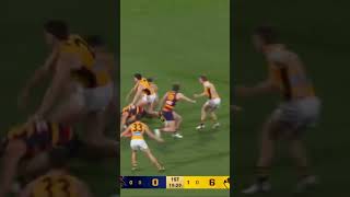 Nick Watson kicks a goal under pressure in the SF.