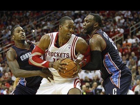 Dwight Howard Dominates in Debut