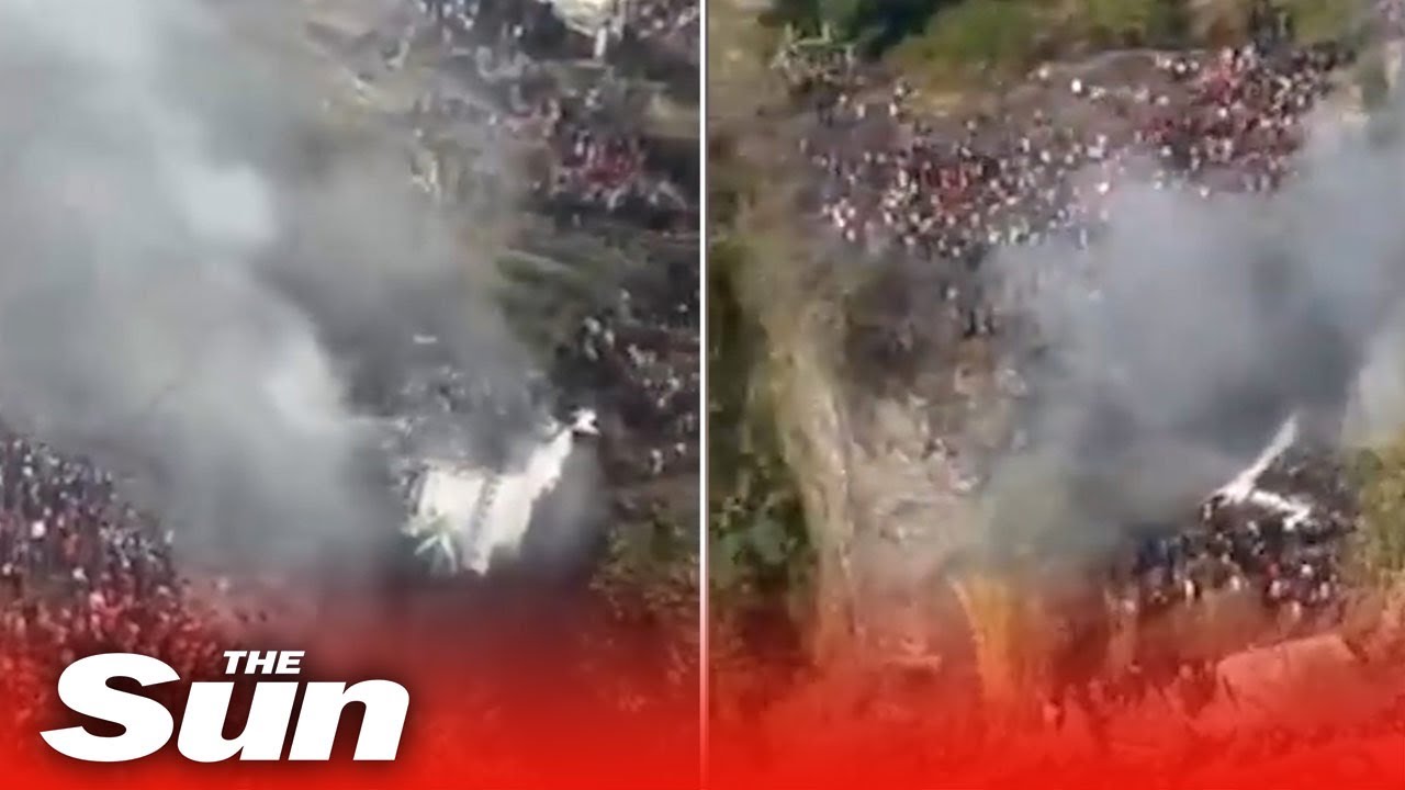 Aerial footage shows rescue crews at scene of Nepal plane crash - YouTube