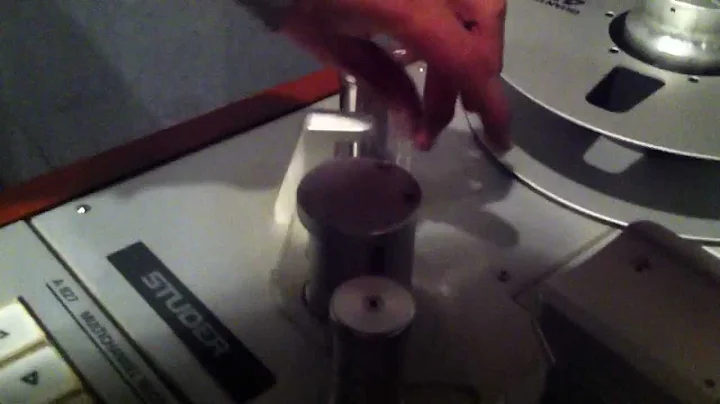 How to load a reel of tape on a Studer A827 tape machine. Strokes on the keys
