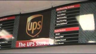 Videoblogging: UPS Store Color Copy Sale and Anca Adds Facebook Sign To Canopy