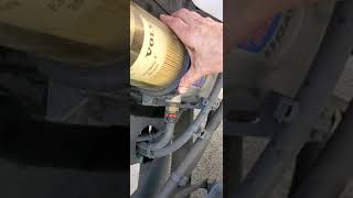 How to change a water separator fuel filter Volvo truck