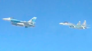 Flight of Russian Tu-95 and Su-30SM missile carrier with US F-16 near Alaska