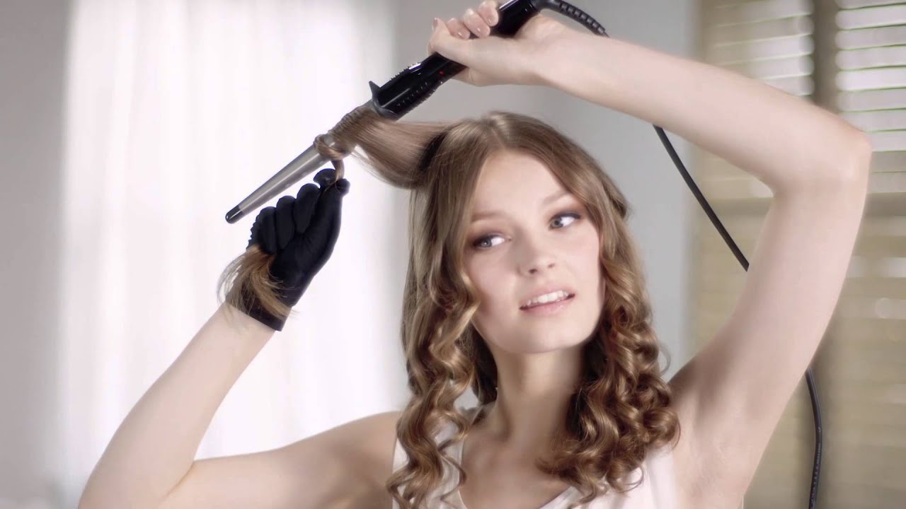 How do you use a curling wand?