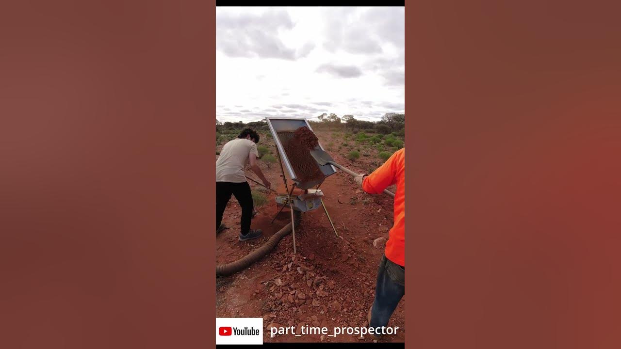Using a Dry blower sampling a new gold prospecting spot Gold