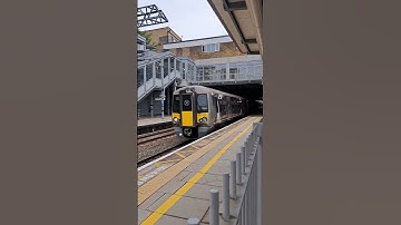 Heathrow Express Class 387 zooms past Ealing Broadway