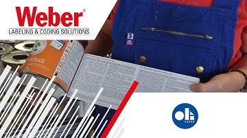 Labeling system wraps round containers with multilingual booklet labels at Oli Lacke