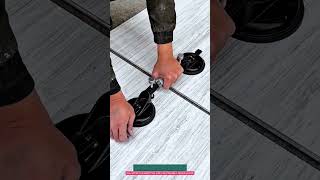 Dual-Suction Tile Alignment Tool Joins 2 Large Tiles Using a Threaded Adjuster