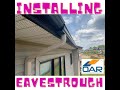 INSTALLING SEAMLESS EAVESTROUGHING ON TOWNHOME