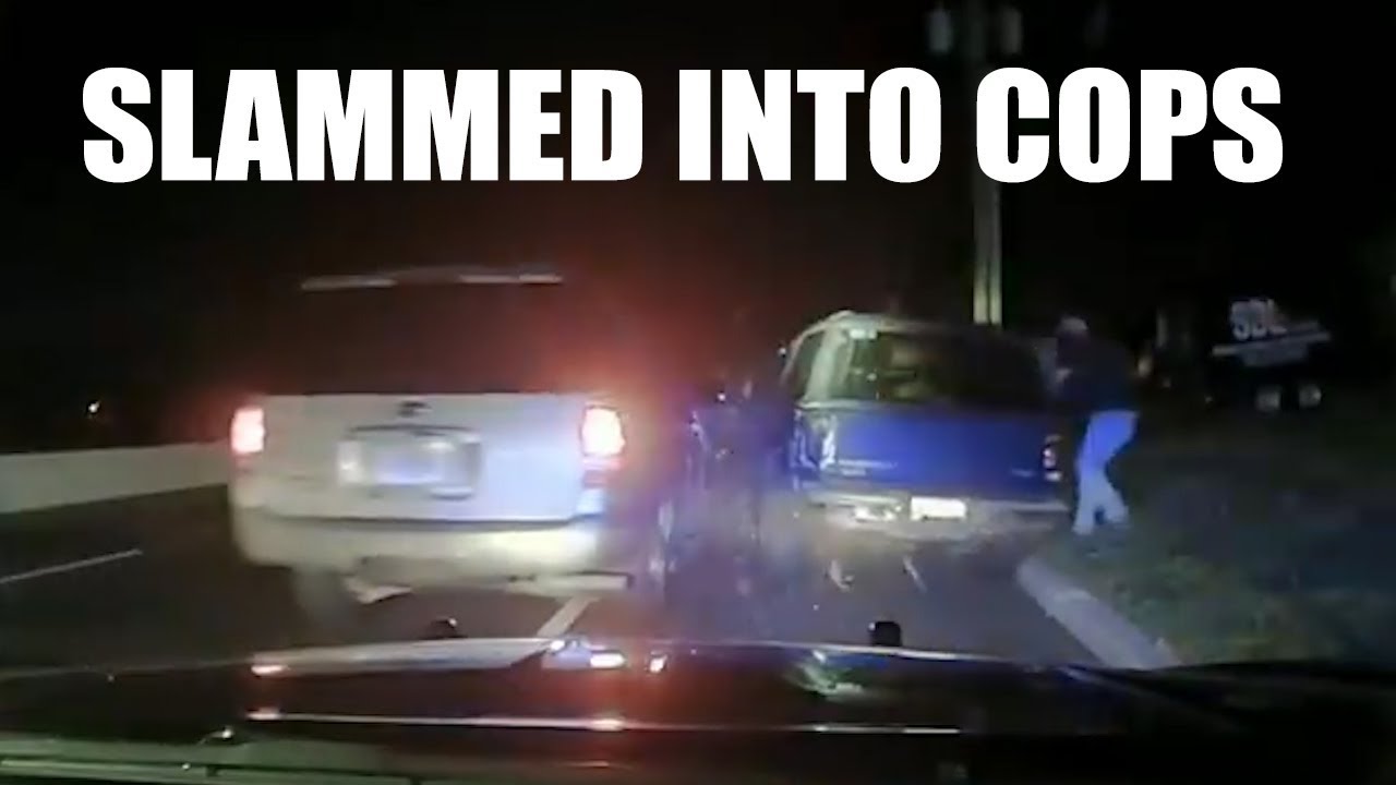 caught on camera uk Alleged DWI driver slams into car, hurting cops