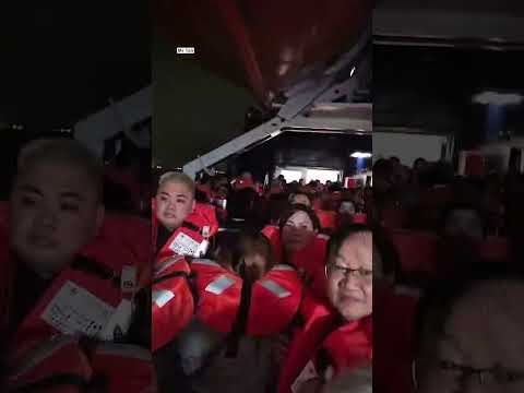 Passenger videos show evacuation after fire on World Legacy cruise ship