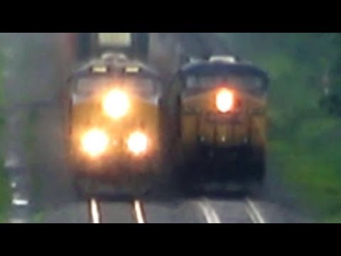 bnsf 5729 CSX Stack Train Passes CSX Oil Train
