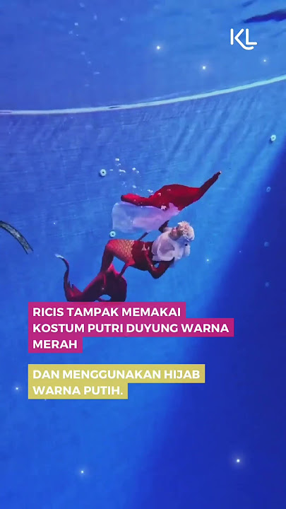 Ria Ricis mengibarkan bendera Merah Putih di dalam air