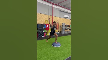Split squat band overhead rotation against bosu