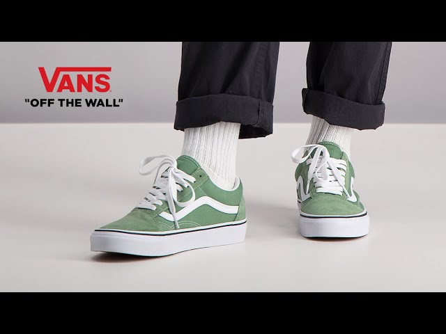 green vans on feet