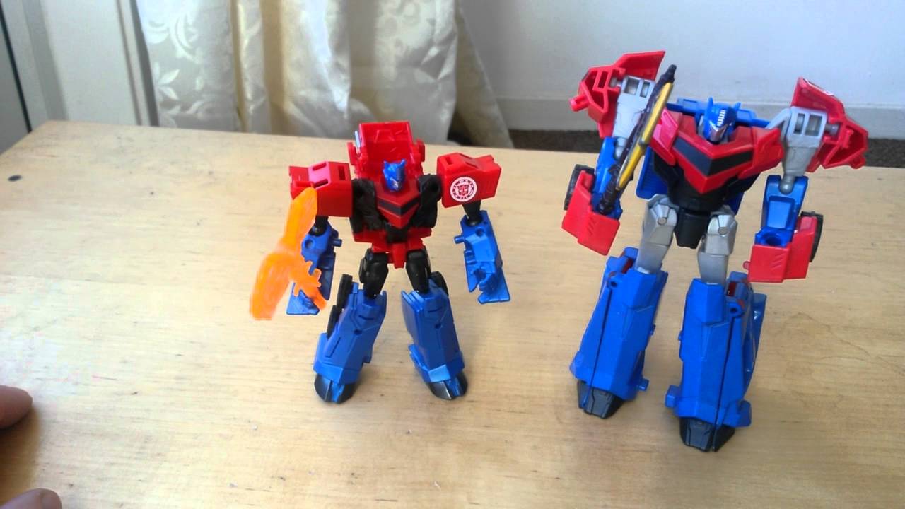 Transformers RID Decepticon Hunter Optimus vs Bludgeon YouTube