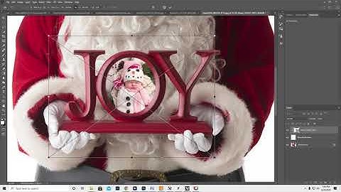 Santa holding a JOY frame for Photoshop.  PHOTO MASK in Layers. Link in comments