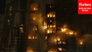 RAW VIDEO: Massive Fire Engulfs High-Rise Building In Hong Kong