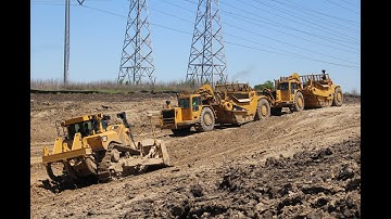 Massive Fleet of Caterpillar 657 Scrapers Move Mountains in Texas