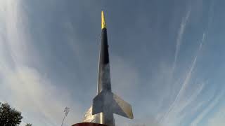 Estes Mean Machine with an Estes D12 5.  Added custom payload bay area.  Very old hot wheel payload.