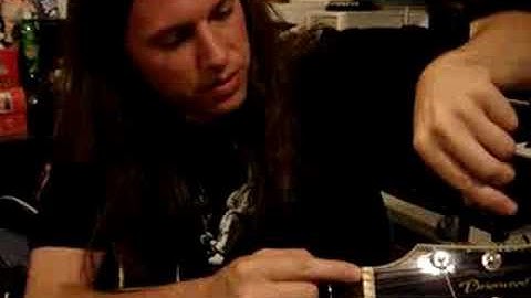 Changing Strings on a Guitar Part 2