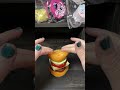 Watch this! I press the peelable cheeseburger taba squishy into my desk and no mess is left behind