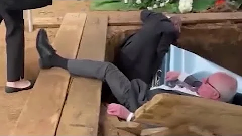 Pallbearers plunge into grave as platform collapses during funeral