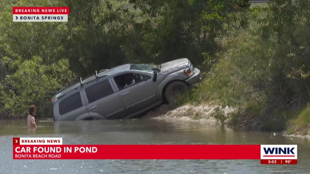 FHP investigating car submerged in pond off I-75 in Bonita Springs