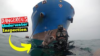 How is an underwater inspection on a cargo ship done?