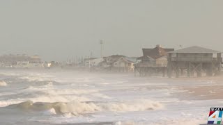 Coastal communities keep an eye on the storm as they prepare for its effects