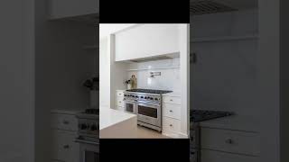 Custom nook and cabinetry for commercial sized oven. Built in hood range completes the look #kitchen