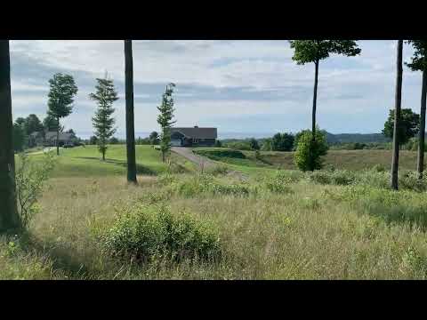 9459 W Sleepy Valley Drive, Empire, MI home video tour