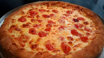 Como esquentar pizza no forno elétrico?
