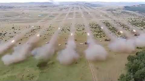 indian pinaka rocket launching army multi barrel rocket launcher fire.pinaka missile