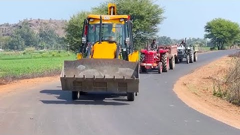 JCB 3DX Xpert loading field mud Mahindra 275 tractor Eicher 485 with trolley