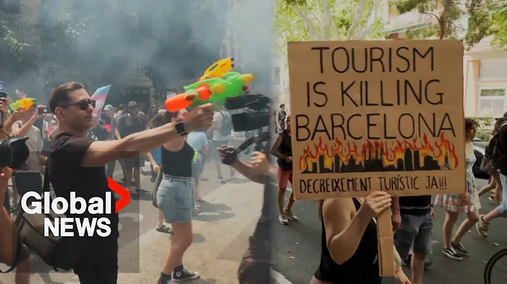 Barcelona locals shoot water at visitors in protests against mass tourism