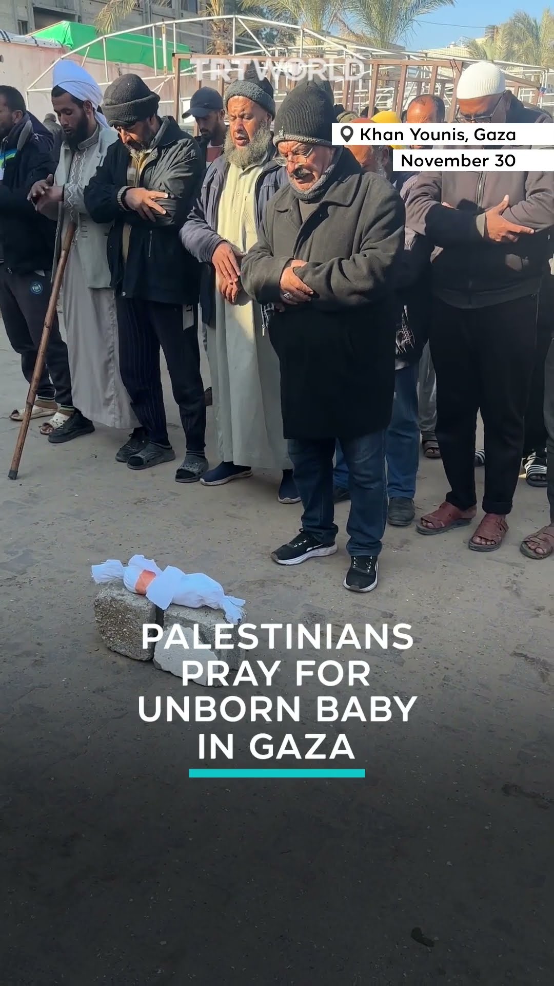 Palestinians pray over baby who died in the womb amid Gaza war