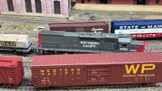 Southern Pacific’s EMD SD40T-2 Tunnel Motor #8351 with a couple cars.