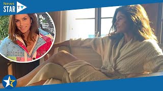 Cindy Crawford captures the perfect morning light as she basks in the sunrise wearing a robe 198775