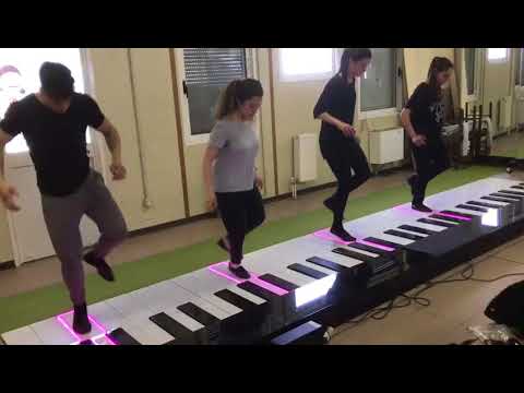 Sun Lin Pianoforte gigante da pavimento Sun Lin Pianoforte gigante da pavimento