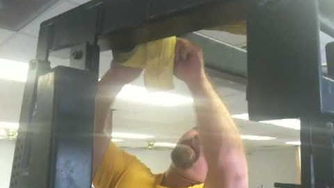 Setting up the safety straps on the monolift.