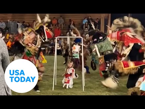 Baby jumps around as elders dance during First Nations powwow | USA TODAY