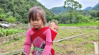 Mother and daughter are happy to have a little girl living with them to look after their children