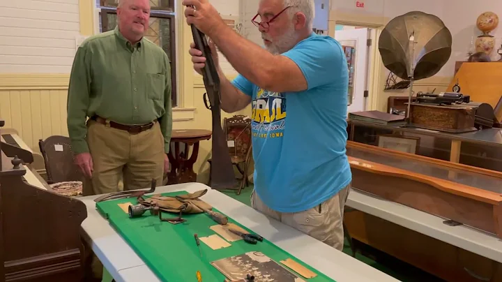 PE Inspecting the Fred Gilbert gun