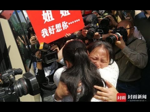 Chinese parents reunite with daughter after 24-year search