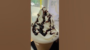 Chocolate fudge syrup overload on Vanilla Ice Cream Chuckie Float Drink