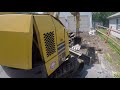 excavating pavement with komatsu pc28